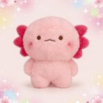 Une peluche kawaii axololt boudeuse rose, toute douce, avec un petit visage triste et des branchies rouges, posée sur un fond pastel avec des étoiles et des fleurs.
