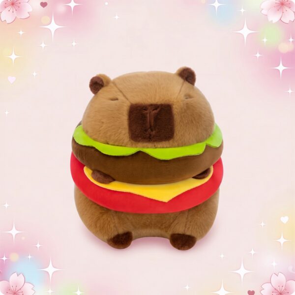 Une peluche capybara hamburger kawaii ronde et toute douce, avec des couches de hamburger vert, jaune et rouge, sur un fond rose pastel avec des cœurs et des étoiles.