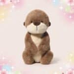 Une peluche Loutre de mer Kawaii au pelage marron doux, assise bien droite sur un fond pastel décoré d’étoiles et de petits cœurs.