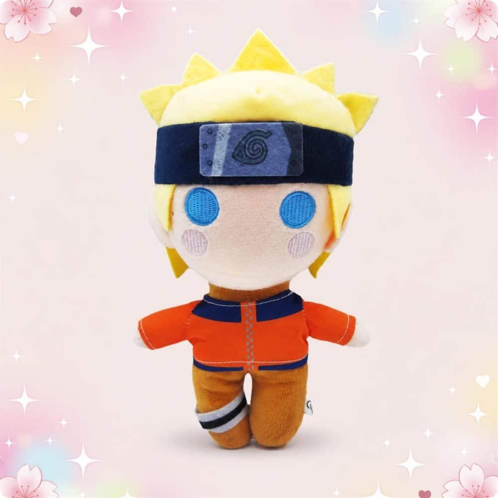 Une peluche Naruto Uzumaki 23 cm représentant un petit personnage blond en tenue orange, avec bandeau bleu, sur un fond rose décoré d’étoiles et de cœurs.