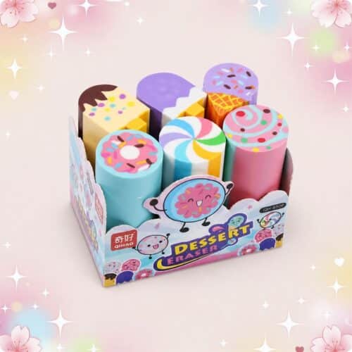 Une boîte de Gomme Kawaii 6 pièces en forme de dessert, avec six gommes colorées ressemblant à des pâtisseries, posées dans un présentoir décoré de petits dessins mignons.