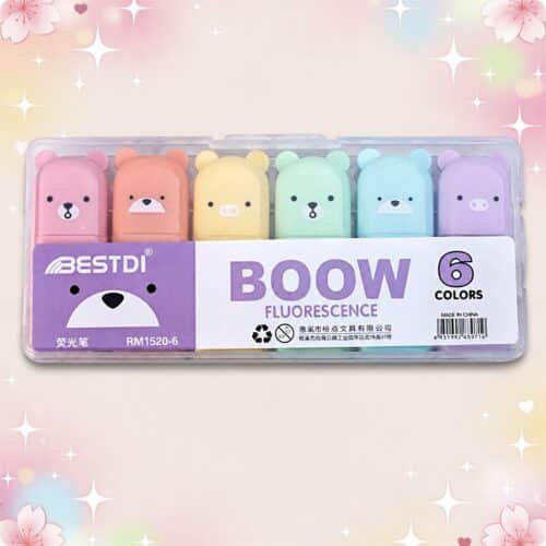 Un lot de 2 paquets de feutres Kawaii coloris pastel rangés dans une boîte transparente, avec 6 feutres aux couleurs douces et des petits visages d’animaux.