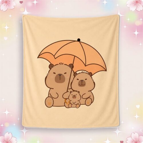 Un plaid kawaii famille de capybaras sous un parapluie, avec trois capybaras mignons dessinés en beige sur fond doux et pastel.