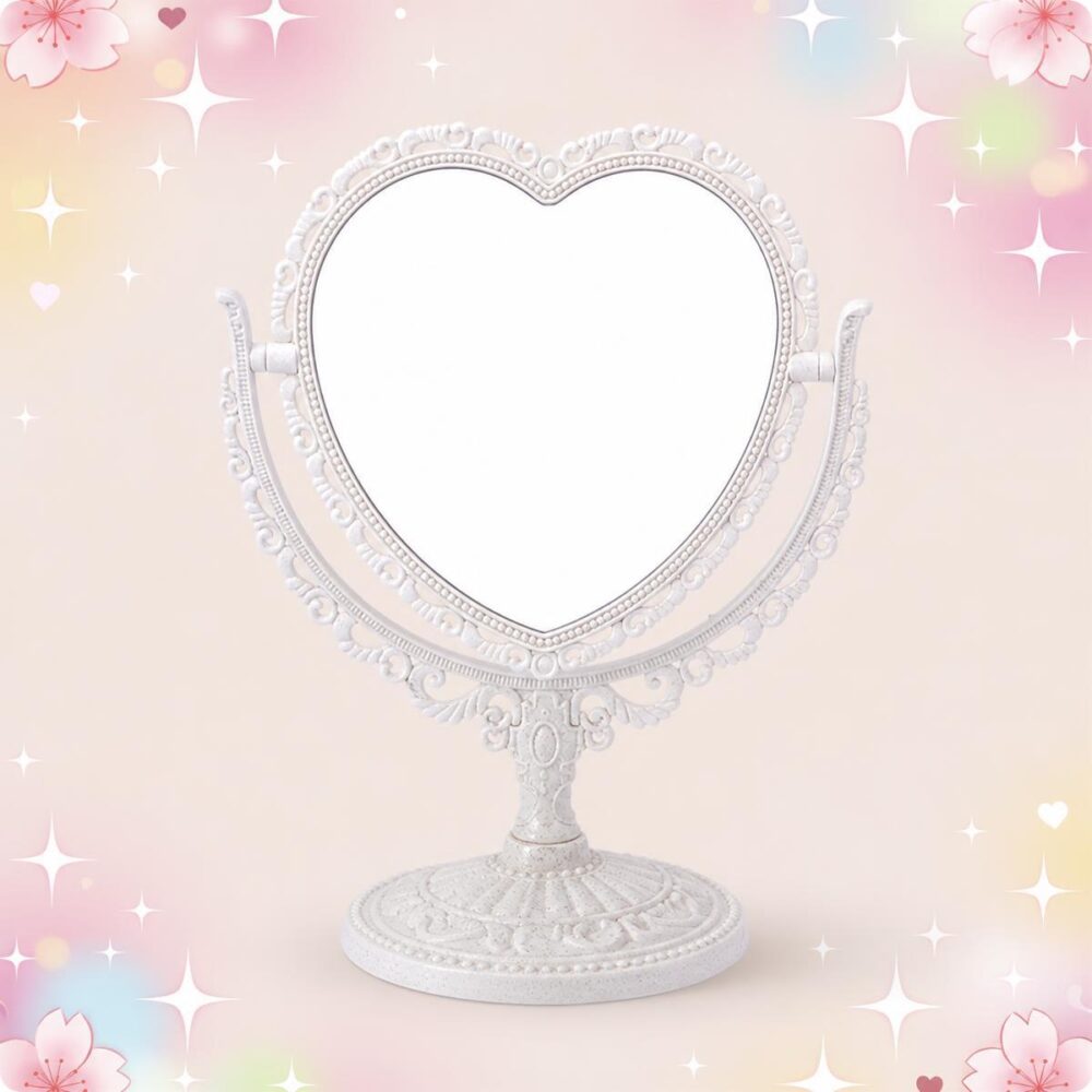 Un Miroir Kawaii en cœur style dentelle et base métal blanc, avec un cadre en forme de cœur sur un support décoratif, sur fond rose pastel avec petites étoiles.