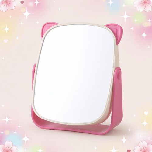 Un miroir kawaii rose pliable à oreilles de chat rotatif, posé sur un fond pastel décoré de petites étoiles et de cœurs.