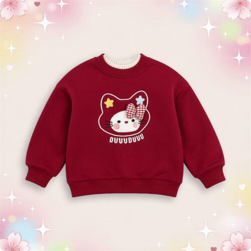 Un pull kawaii Hello Kitty pour petite fille bordeaux, avec un grand motif Hello Kitty et un nœud à carreaux, posé sur un fond rose décoré de petites étoiles.