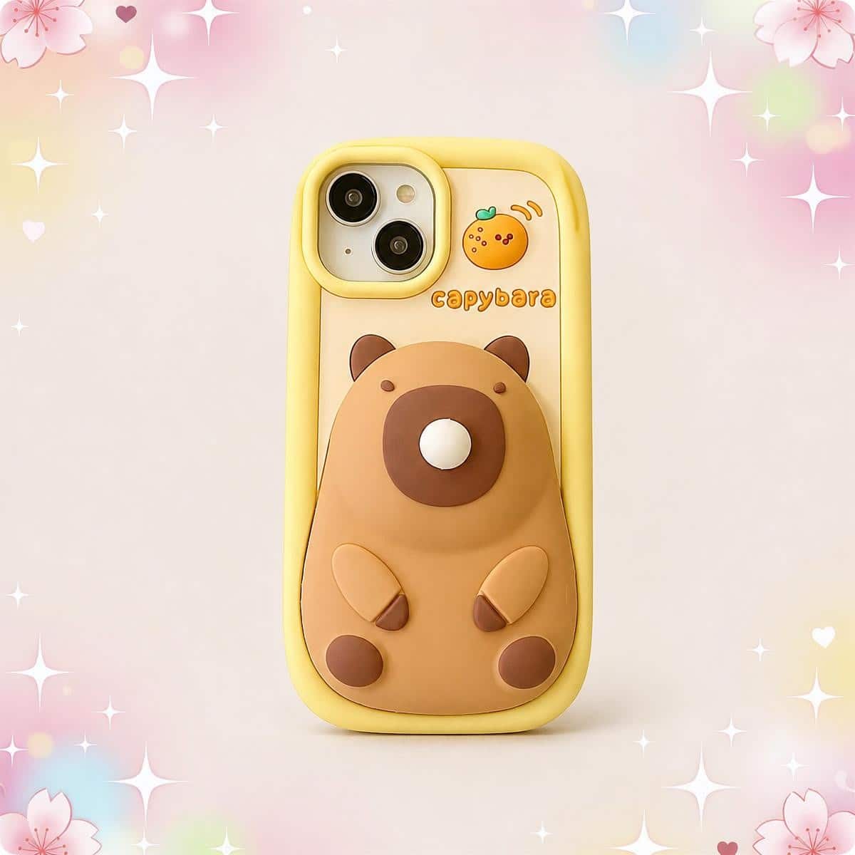 Une coque téléphone kawaii Capybara 3D avec bulle au nez jaune, décorée d’un capybara mignon en relief sur fond pastel avec petites étoiles et cœurs.