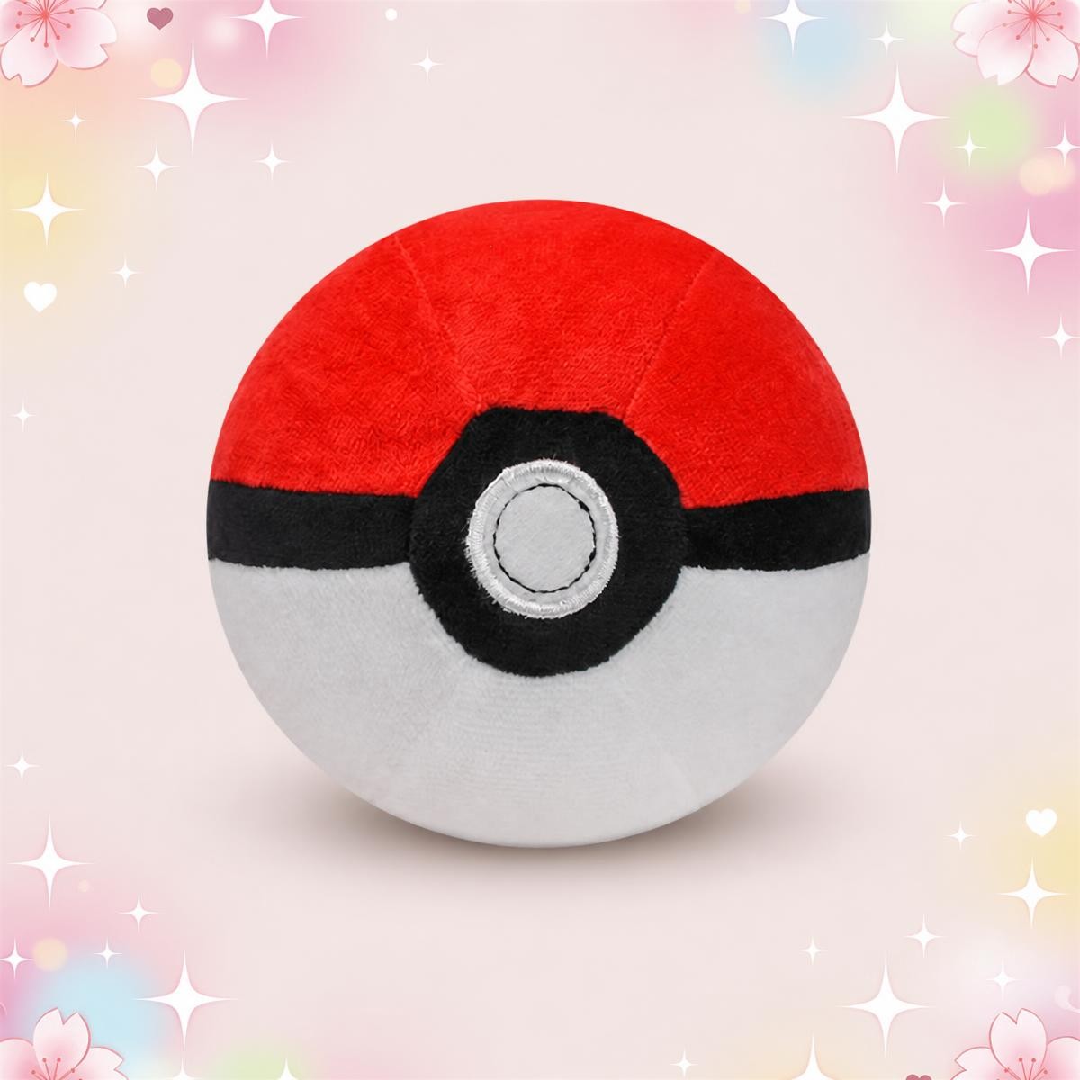 Une peluche en forme de Pokéball ronde et douce, rouge et blanche avec une bande noire et un bouton central, posée sur un fond pastel décoré de fleurs et d’étoiles.
